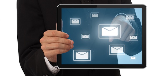 Businessman pressing e-mail buton